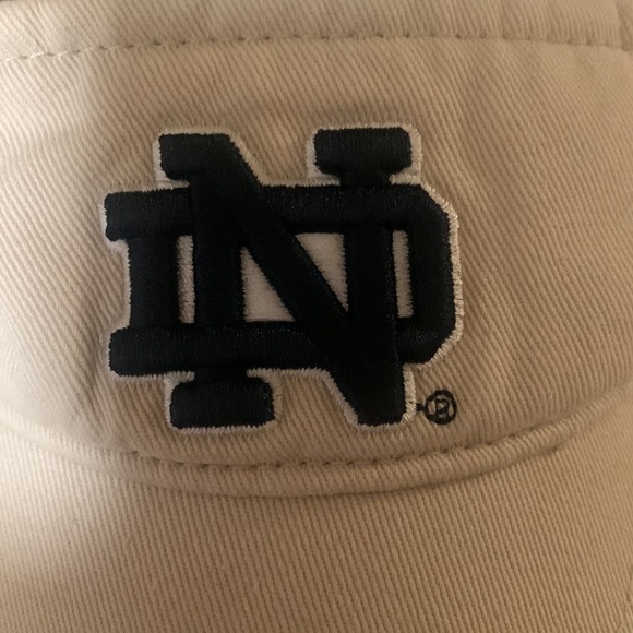 One size tan with navy logo Notre Dame visor. - Picture 2 of 4